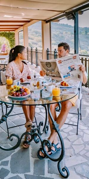 couple eating breakfast on the terrace